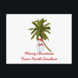 Vrolijk kerstfeest uit N. Carolina, Sneeuwman palm Feestdagenkaart<br><div class="desc">Een schattige sneeuwman onder een palmboom,  om 'Merry Christmas' te wensen,  te zien op dit lieve kerst-briefkaart om vanuit North Carolina te verzenden</div>
