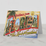 Vrolijk kerstfeest van de Florida vintage Kaart<br><div class="desc">Merry Christmas from Florida Het land van de zon  stijl gebaseerd op de "Groeten uit" briefkaarten van het verleden. Heldere retrokleuren met zon,  palmboom en strand,  samen met letters gevuld met scènes uit Florida. Bewerk de binnentekst als je wilt.</div>