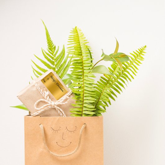 Vrolijk kerstfeest van tot handvol met zwarte goud etiket