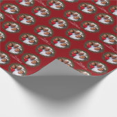 Vrolijk kerstfotofeest met rode kerst cadeaupapier (Hoek)