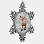 Vrolijk kerstgedoe met een pet tin sneeuwvlok ornament (Links)