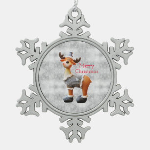 Vrolijk kerstgedoe met een pet tin sneeuwvlok ornament