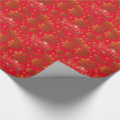 Vrolijk kerstgouden mousserend op rode achtergrond cadeaupapier (Hoek)