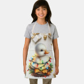 Vrolijk kerstmannetje verstrikt in lichtjes schort (Insitu)