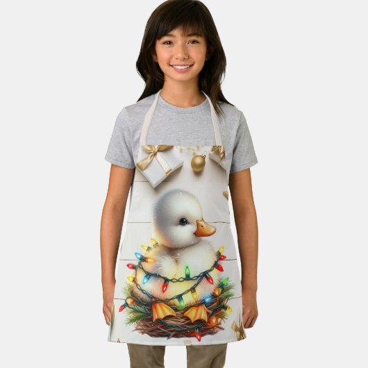 Vrolijk kerstmannetje verstrikt in lichtjes schort (Insitu)