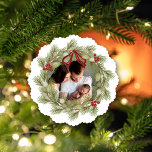 Vrolijk Kerstmis Foto Krans Holly Berries Ornament Kaart<br><div class="desc">This design features Merry Christmas with merry Christmas holiday werath with a modern foto family 2 two picture layout, simpelweg elegant familiy minimalist, rustic green typography script red, a trendy botanical pine nature leaves, stylish trendy brush script font, simpwatercolor greenery branch, Christmas red holly berries, green winter foliage holly berry,...</div>
