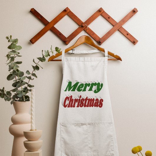 Vrolijk kerstrood en groene typografie lang schort