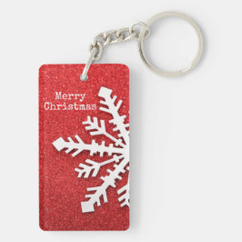 Vrolijk kerstrood en witte sneeuwvlok sleutelhanger