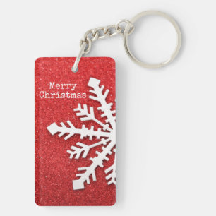 Vrolijk kerstrood en witte sneeuwvlok sleutelhanger