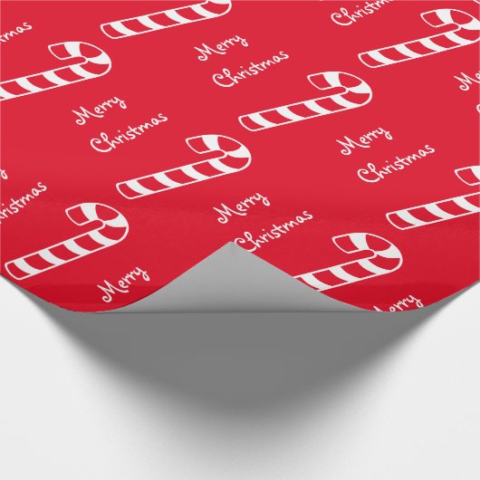 Vrolijk kerstrood en witte stripte snoepjes cadeaupapier (Hoek)
