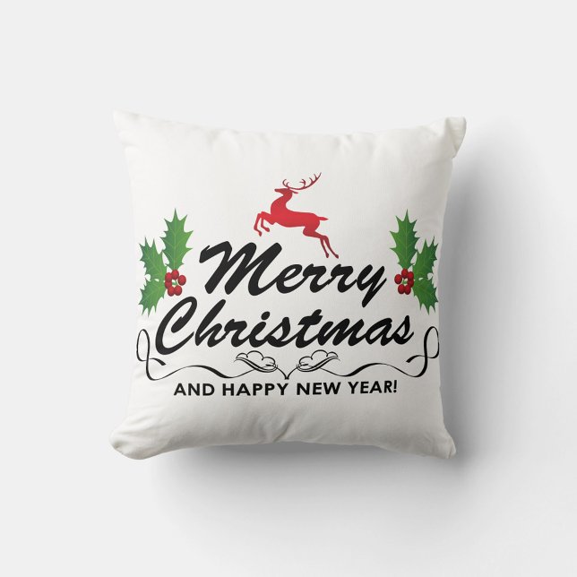 Vrolijk kerstSierkussen Kussen (A throw pillow with the words "Merry Christmas" in a decorative black font, with a red reindeer.)