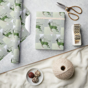 Vrolijk kerstspringend hertenwikkelpapier cadeaupapier