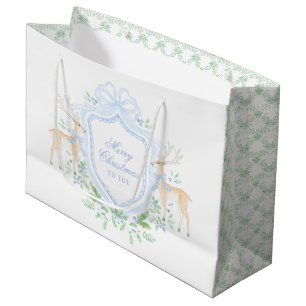 Vrolijk kersttrellis en swag met blauwe boog groot cadeauzakje