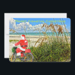 Vrolijk Kustkerstfeest Sanibel Island Beach Santa Feestdagenkaart<br><div class="desc">Vrolijk kustkerstfeest! Deze prachtige vakantie Flat Kaart beschikt over een foto afbeelding van sensationele Sanibel Island strand met zijn torenhoge zeeen haver en de prachtige blauw/groene wateren van de Golf van Mexico. Het feestelijke ontwerp omvat Santa rijden op zijn fiets om pakketten te leveren op dit eiland oase. Op de...</div>