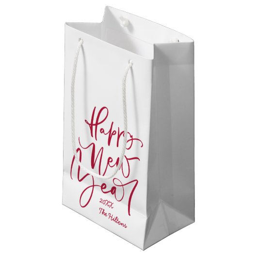 Vrolijk nieuw jaar met rode letters klein cadeauzakje (Voorkant Gekanteld)