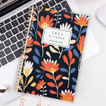 Vrolijk Sinaasappel Bloemenpatroon Gepersonaliseer Planner<br><div class="desc">Personaliseer deze planner met jouw naam in zwarte cursief omlijst door een witte rechthoek,  op een gedurfd,  vrolijk patroon van oranje en witte bloemen op een zwarte achtergrond.</div>