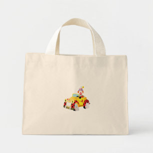 Vrolijke clown rijdt in een grillige gele auto mini tote bag