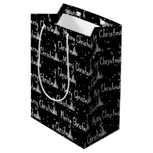 Vrolijke kerstboom op zwart medium cadeauzakje