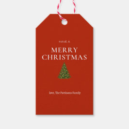 Vrolijke kerstgroet met boom op rood gebruik cadeaulabel
