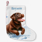 Vrolijke labrador retriever puppy hond sneeuwvlokk kleine kerstsok (Voorkant)
