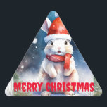 Vrolijke Merry Christmas Rabbit Triangle Sticker -<br><div class="desc">Voeg een vleugje feestelijke grillen toe met onze heerlijke konijn met Merry Christmas print driehoek sticker! Elke sticker heeft een schattig konijn omringd door vrolijke kerstgroeten, genesteld in een charmant driehoekig ontwerp. Deze hoogwaardige stickers brengen een dosis vakantievreugde naar elk oppervlak. Perfect voor het verfraaien van cadeauverpakkingen, kaarten, laptops of...</div>