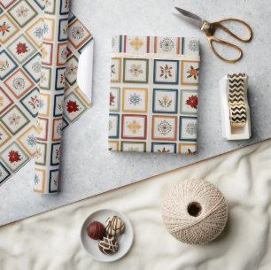 Vrolijke patchwork van kerstelementen cadeaupapier