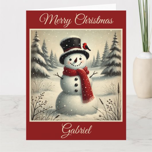 Vrolijke sneeuwman en rode vogel in het sneeuwbos kaart (Voorkant)