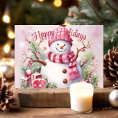 Vrolijke sneeuwman in roze sjaal feestdagen kaart