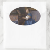Vrouw bij een maagd door Vermeer Ovale Sticker (Tas)