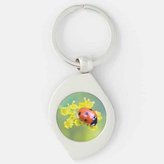 vrouw bovenop sleutelhanger (Voorkant)