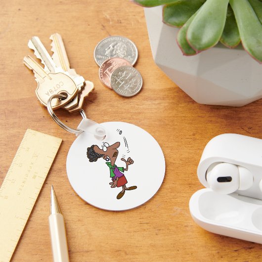 Vrouw die een muntstuk voert sleutelhanger