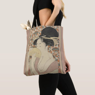vrouw die een tortoise Shell Hair Comb houdt Tote Bag