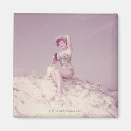 Vrouw die zich op strand terugtrekt magneet (Voorkant)