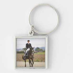 vrouw-dressage sleutelhanger