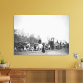 Vrouw en jongen met bultrugaars in Ox Train Canvas Afdruk (Insitu (Woonkamer))