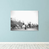 Vrouw en jongen met bultrugaars in Ox Train Canvas Afdruk (Insitu (Houten vloer))