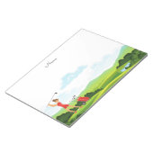 Vrouw golfer in de rode golf op groen notitieblok (Schuin)