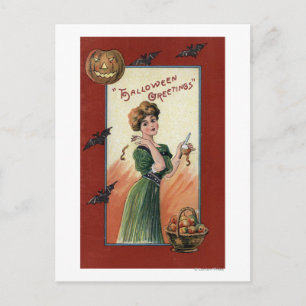 Vrouw in Groene Dress Peeling Apple Briefkaart