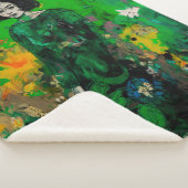 Vrouw in kleurrijk veld sherpa deken (3/4)