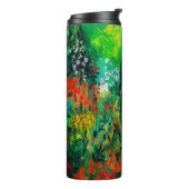 Vrouw in mooie groene weide thermosbeker (Gedraaid links)