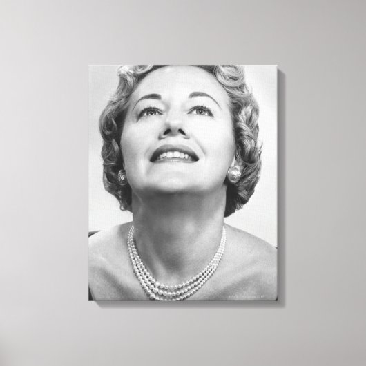 Vrouw kijkt omhoog canvas afdruk (Voorkant)