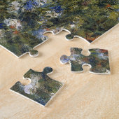 Vrouw met een parasol in een tuin door Auguste Ren Legpuzzel (Zijkant)