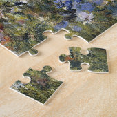 Vrouw met een parasol in een tuin door Auguste Ren Legpuzzel (Zijkant)