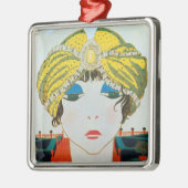 VROUW MET ORIENTAAL GEEL TURBAN METALEN ORNAMENT (Links)