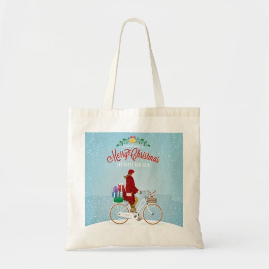 Vrouw op een fiets in de winter met Kerstmis Tote Bag (Voorkant)