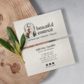 Vrouw verlaat Moon Arch SKINCARE Wellness Day Spa Visitekaartje