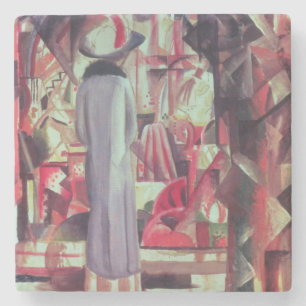 Vrouw voor een groot verlicht raam stenen onderzetter