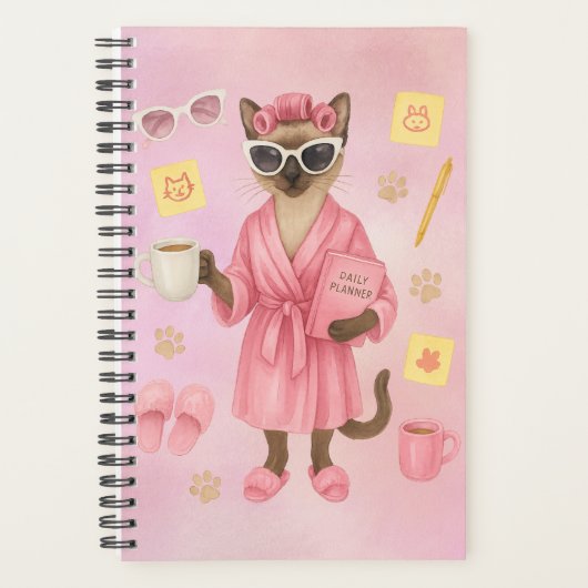 Vrouwelijke kat houdt dagelijkse planner vast (Voorkant)