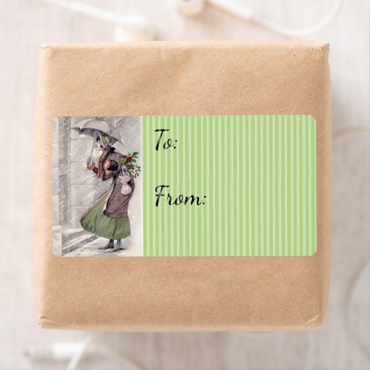 vrouwen die kerstcadeaulabel voor Label kopen (Insitu)