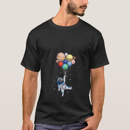 Vrouwen funeste astronaut met planeten in hand voo t-shirt (Voorkant)